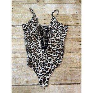 Dream Bandits Lace-Up Bodysuit in Animal Print
